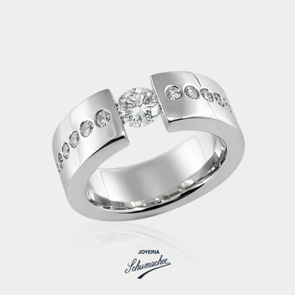 Anillo en oro blanco con un diamante y brillantes | Joyería Schumacher