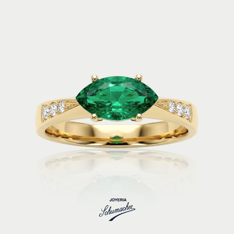 Anillo_en_oro_amarillo_con_esmeralda_marquiz_3_brillantes_Joyeria_Schumacher