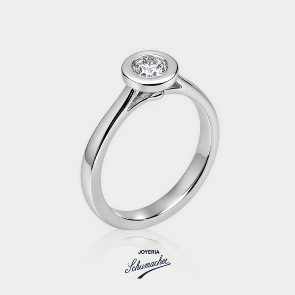 Anillo de compromiso en oro blanco con diamante talla redonda  | Joyería Schumacher