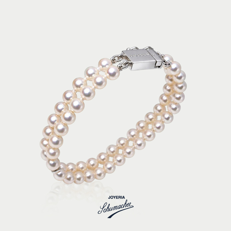 Pulsera_de_dos_hileras_con_perlas_y_broche_en_oro_blanco_Joyeria_Schumacher